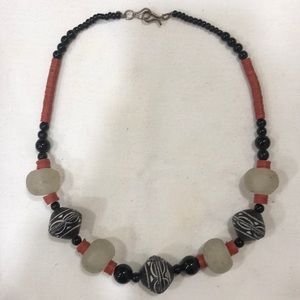 Red, black, and white West African clay and glass bead necklace